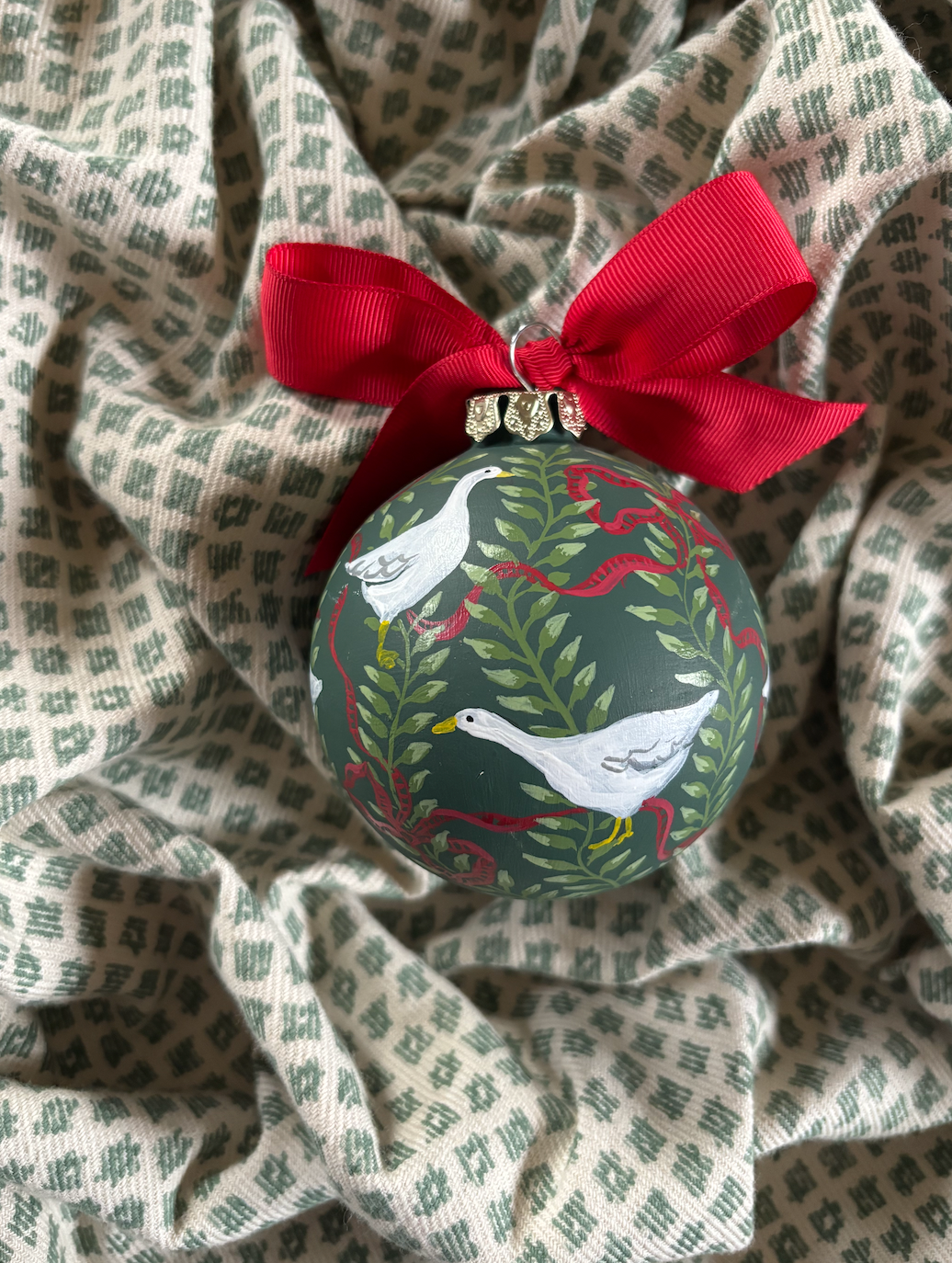 Heirloom ornament - Geese and red ribbon